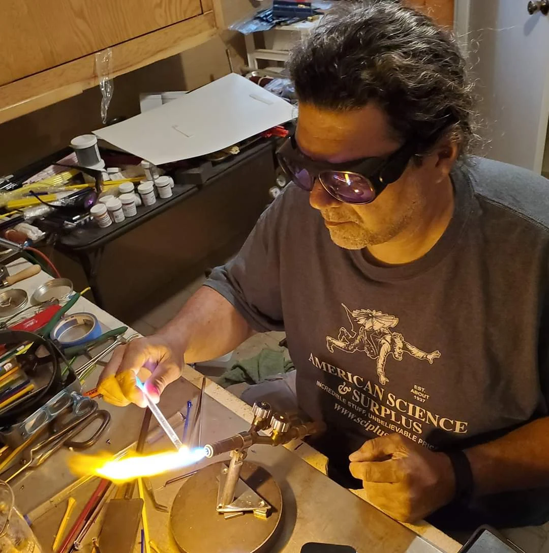 Glass artist Alan Jess Jeskewitz working at the torch